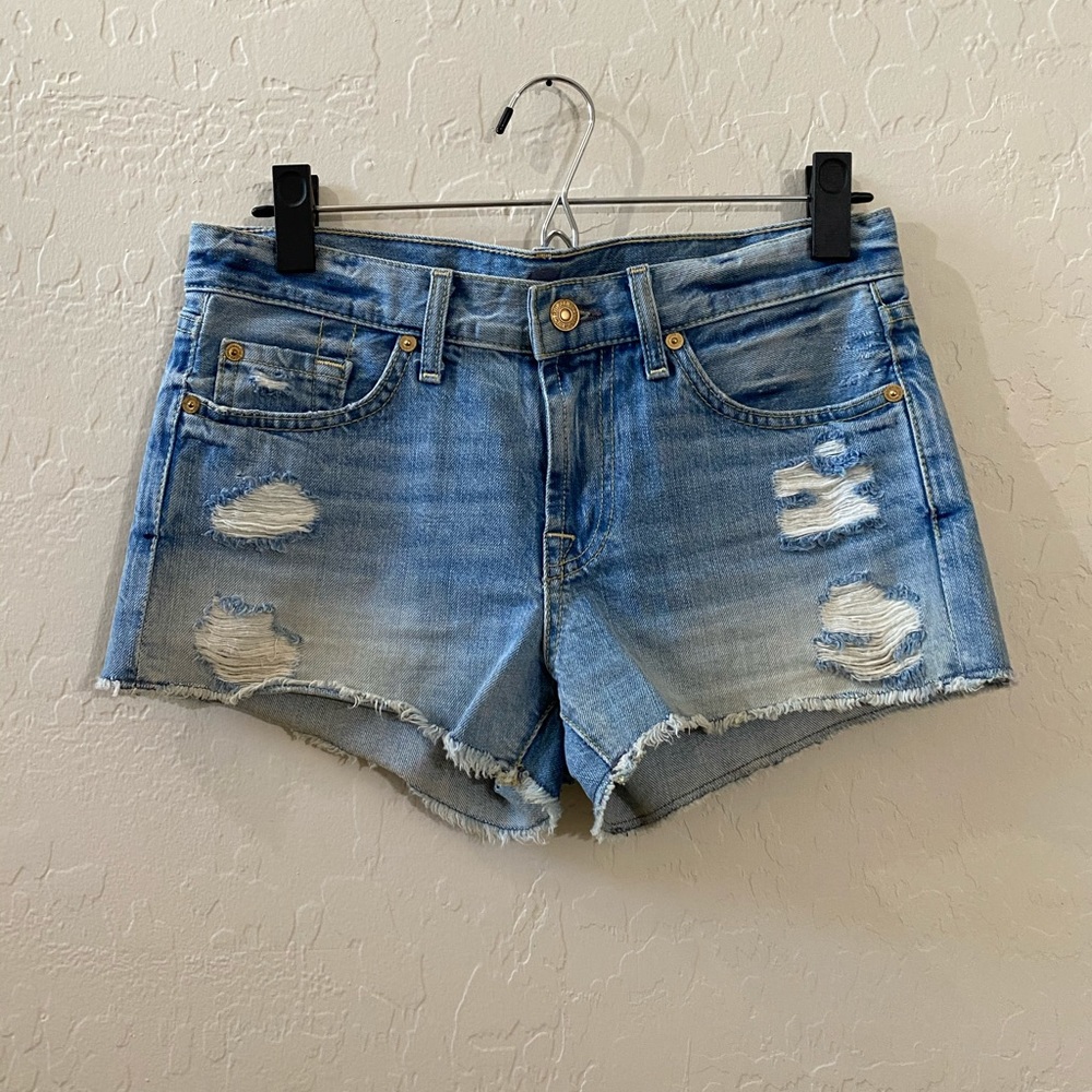 7FAM distressed cutoff shorts size 25 light wash
